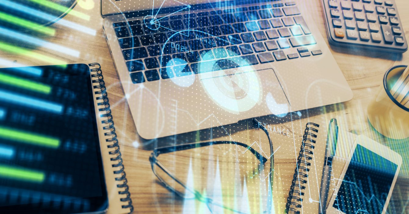 Double exposure of table with computer on background and data theme drawing. Concept of innovation.